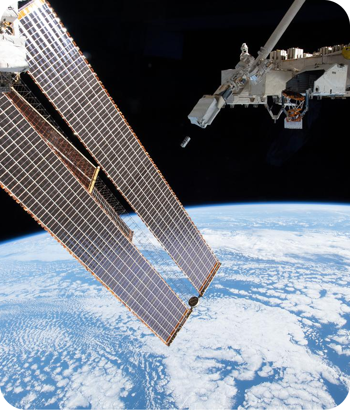 ISS solar panels above Earth