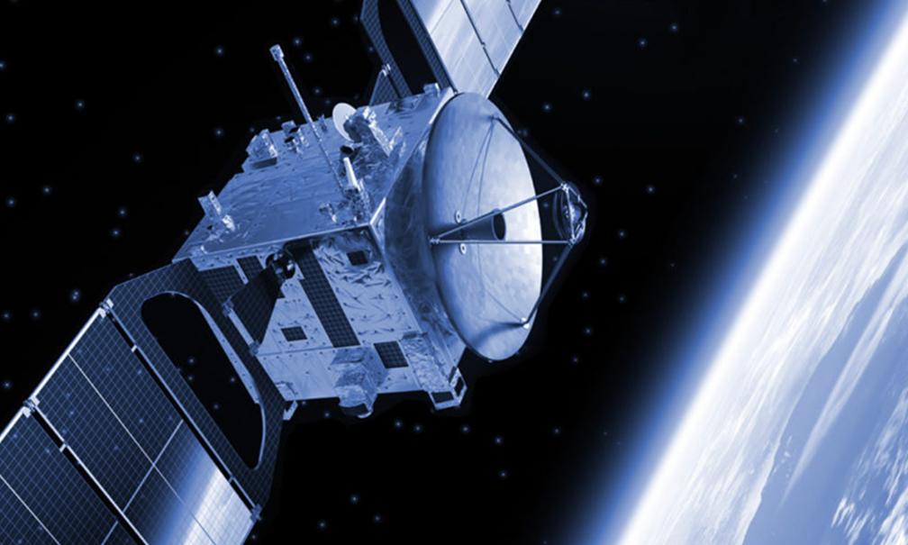 Satellite orbiting Earth in space, blue tinted image