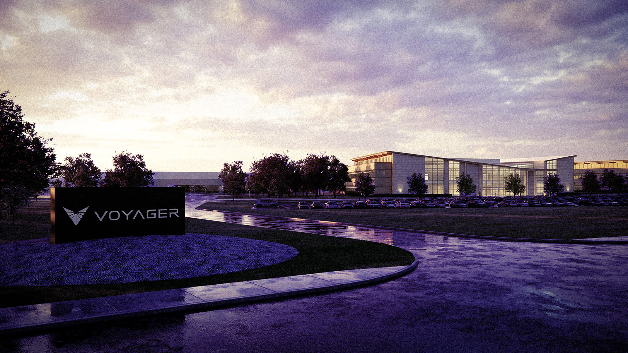 Voyager building at sunset with parked cars.