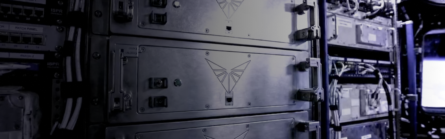 Close-up of spacecraft interior equipment and controls.