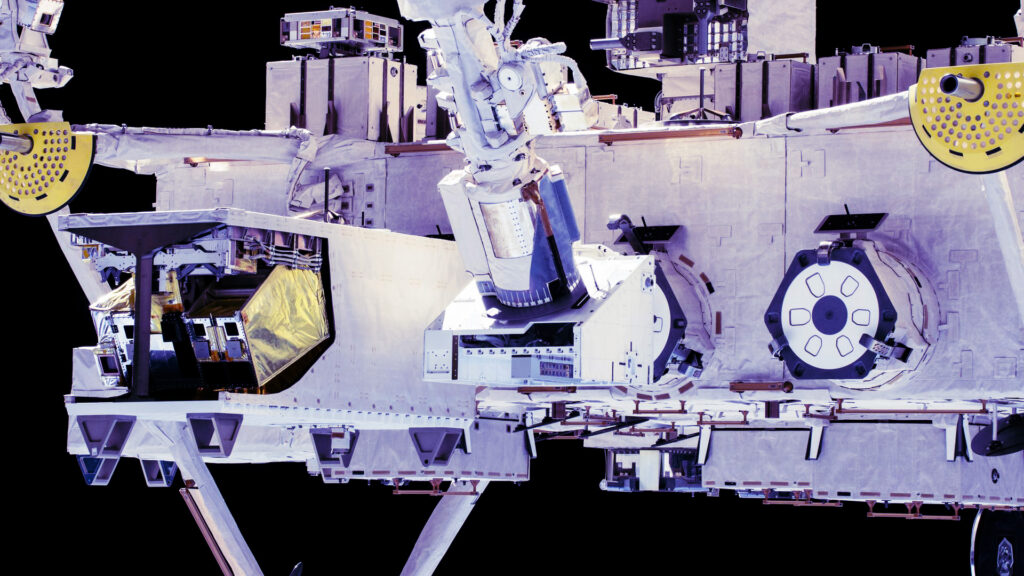 Robotic arm performs work outside space station