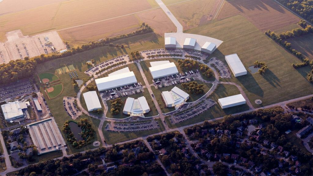 Aerial view of industrial campus with warehouses and parking